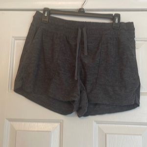 90 degree by reflex shorts. Tie string w/pockets. Charcoal gray. Sz- Large